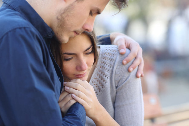 How to Support Your Loved One Through Addiction Treatment man hugging woman supporting them through addiction treatment